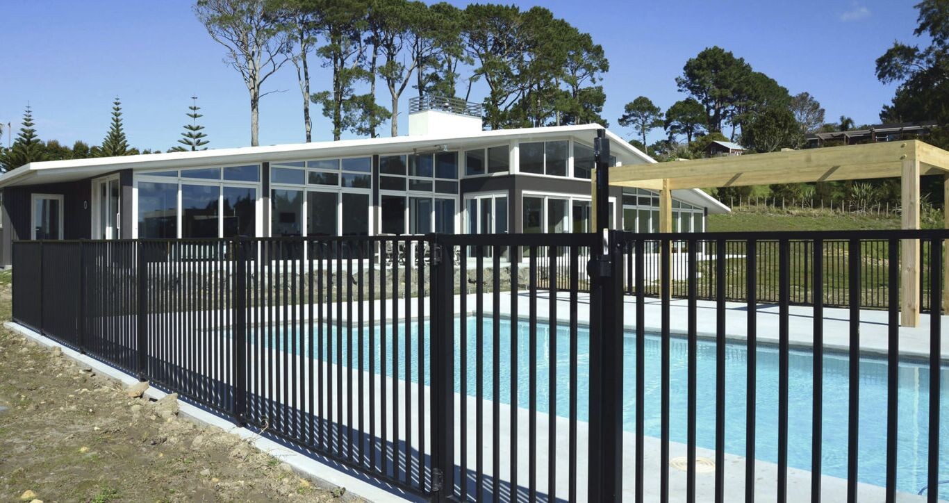 Black aluminum pool fence showing durability and style benefits in Palm Harbor